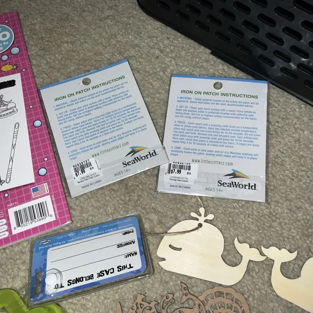 SEAWORLD REUSABLE BAG, GIRLS BUNDLE NECKLACE,SHIRT PINS,KEYCHAIN,PATCH,BOOK, ETC